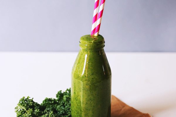 Clear Glass Bottle Filled With Broccoli Shake