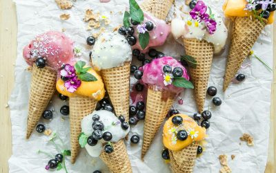 coned ice cream with blueberries and flowers